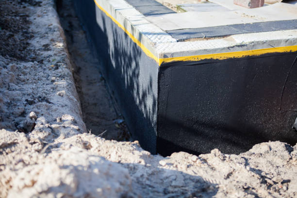Professional Waterproofing technician working in Conesus, NY